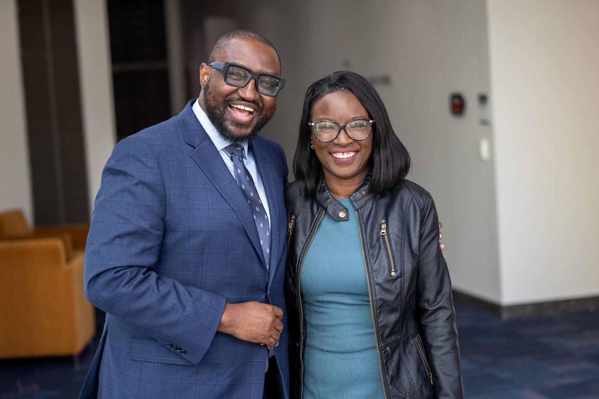 Two colleagues smiling together at the Duke School of Medicine awards ceremony