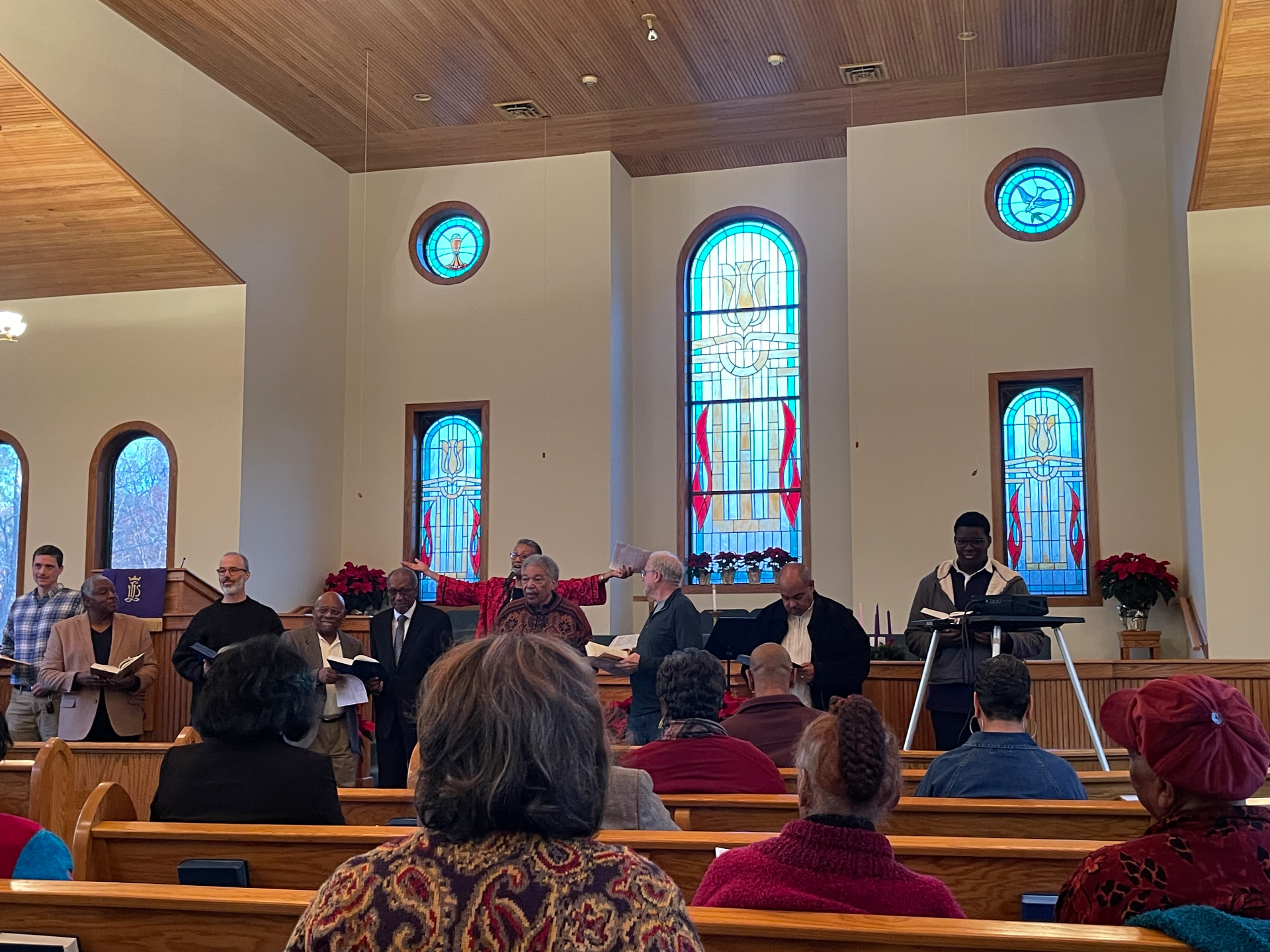 A congregation gathered for a service where REGAL team members joined community members